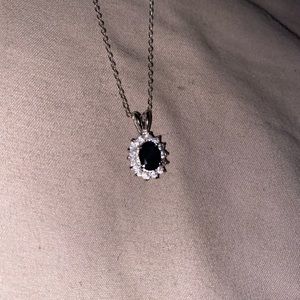 Silver necklace with black gem decal